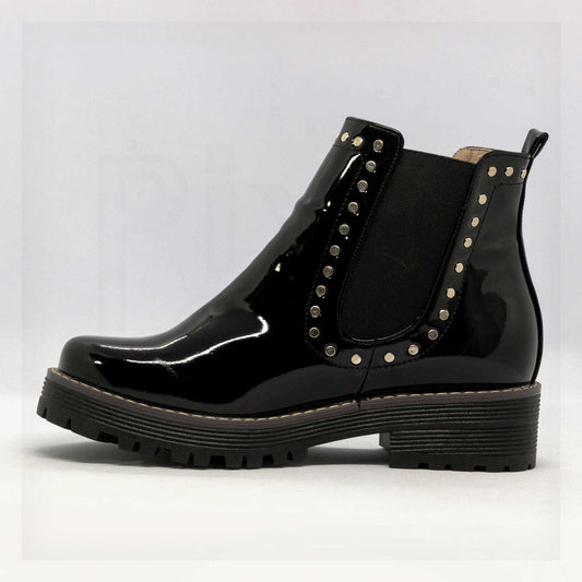 Ale Aguilar Studded Patent Chelsea Lug-Sole Boots in Black Curated by Machine