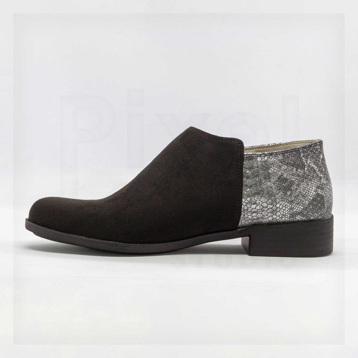Tacones bajos hechos a máquina y a mano